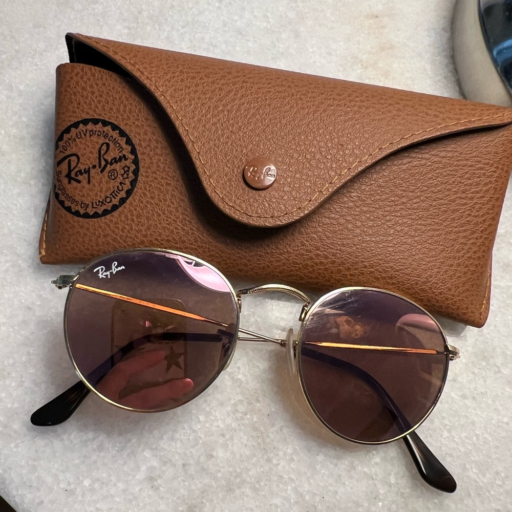 Rose tinted Ray-Bans, in great condition. Comes with case as well.